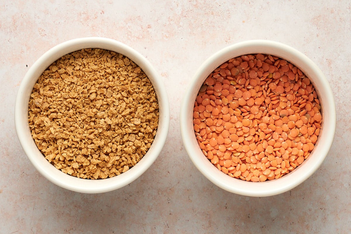 Tvp and red lentils in small bowls.