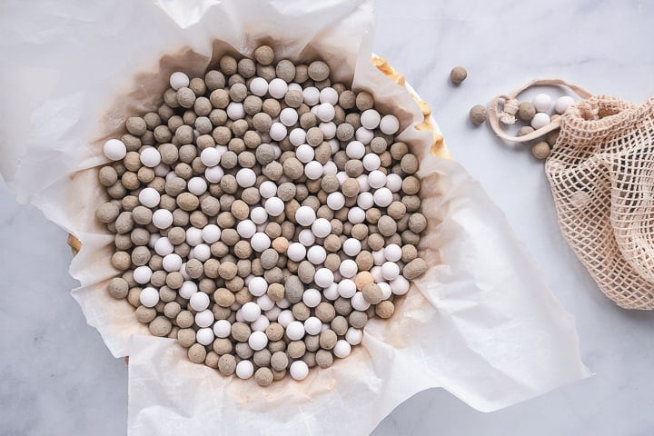Weighted balls on parchment paper