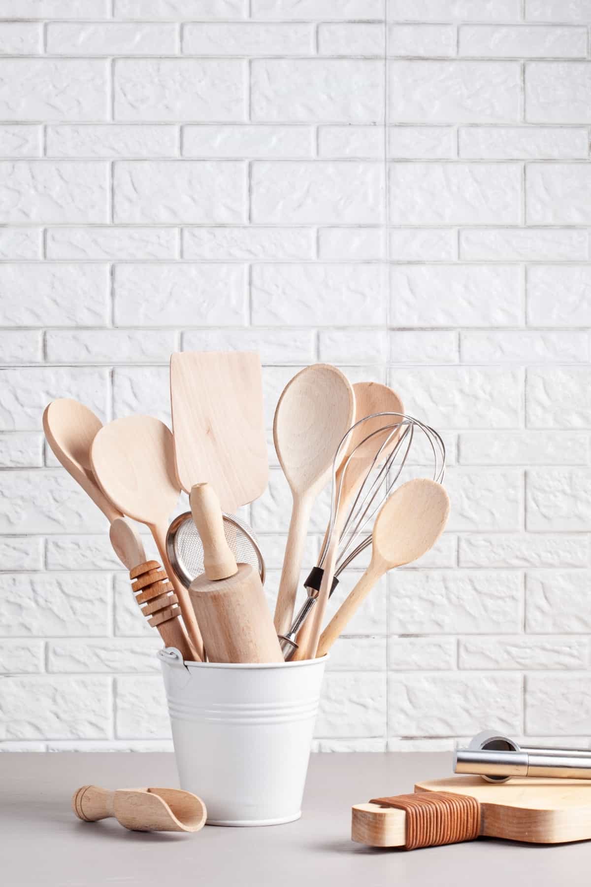 Baking utensils in a holder on a table