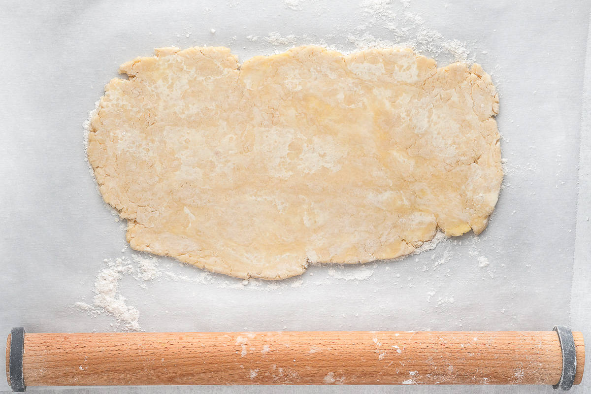 Rolled out dough on parchment paper