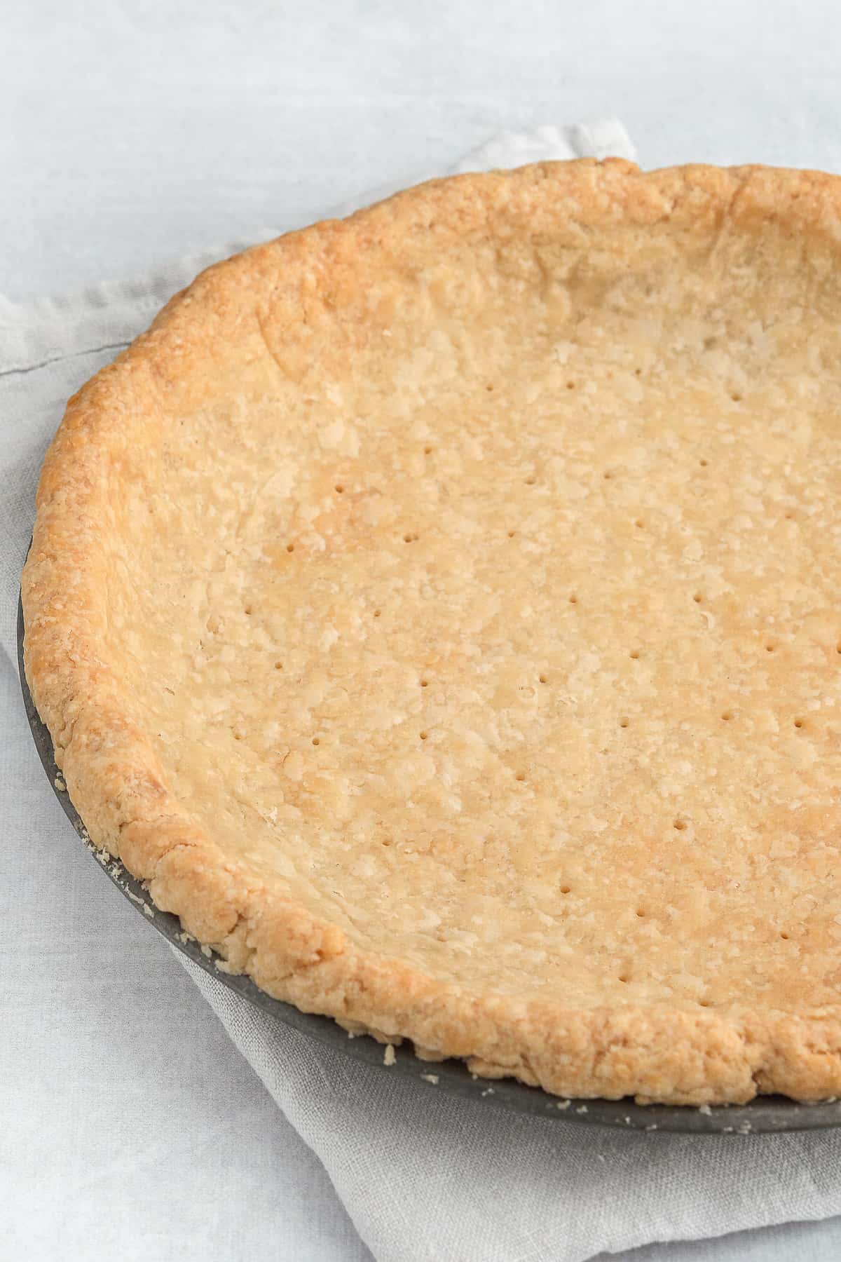 Baked pie crust in pan