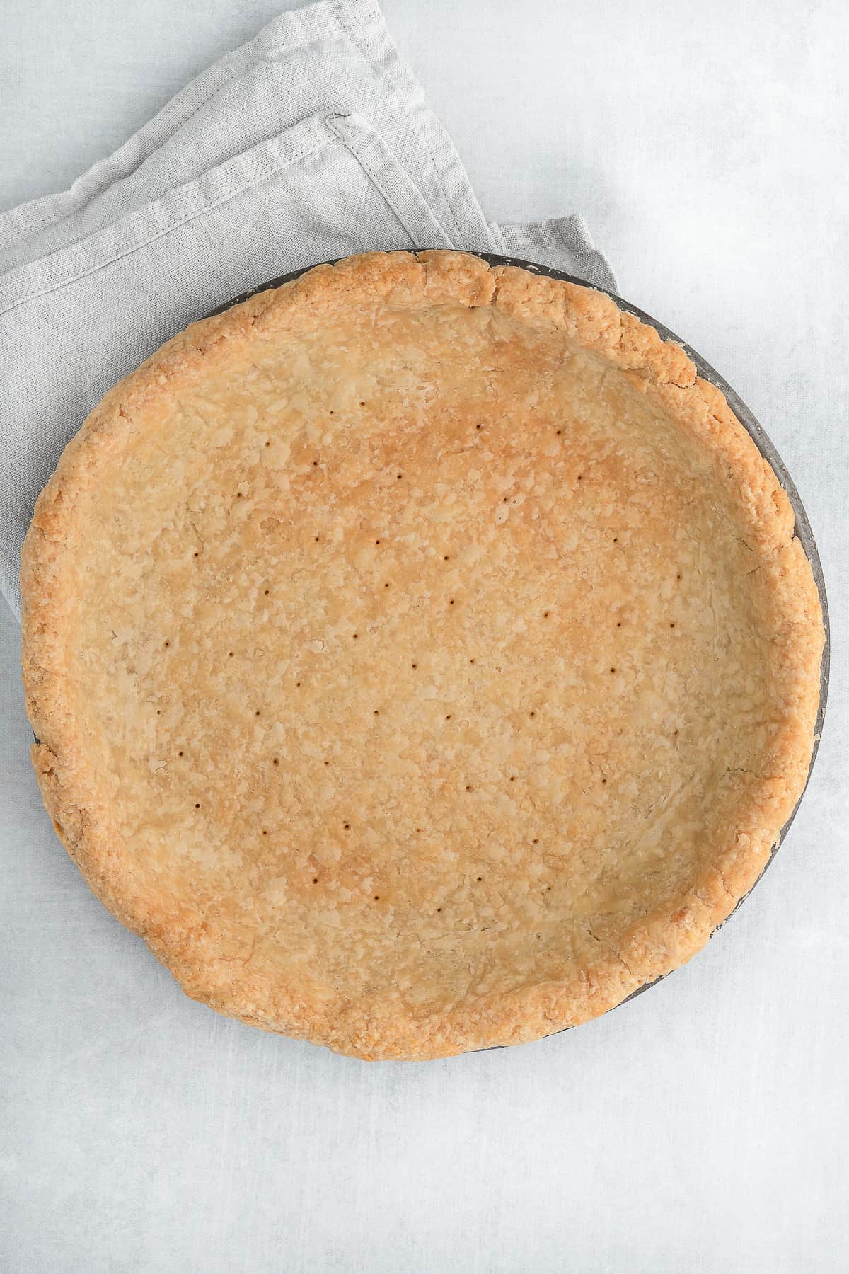Baked pie crust in pan